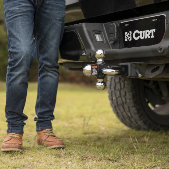 CURT multi-ball mount with three balls and tow hook for versatile towing