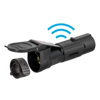 CURT Echo mobile trailer brake controller connected to a smartphone for wireless control
