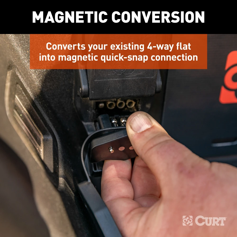 CURT 4-way flat magnetic connector adapter with durable black plastic housing.