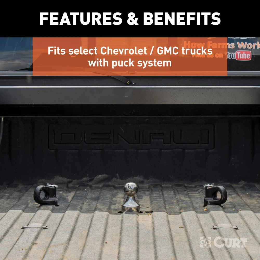 CURT OEM puck system gooseneck safety chain anchors in a truck bed for towing