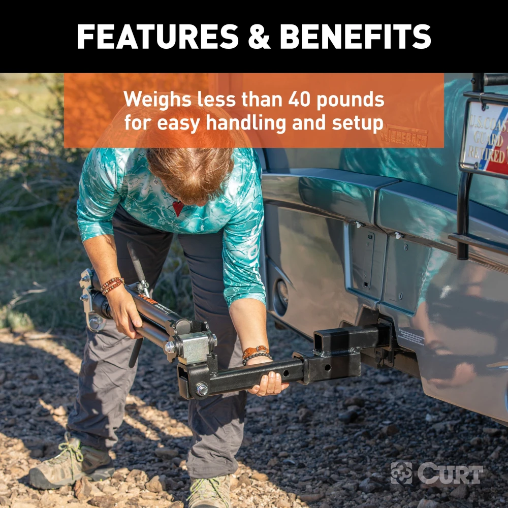 CURT Rambler steel tow bar shown with patent-pending latches for easy non-binding release, ideal for towing various vehicles.