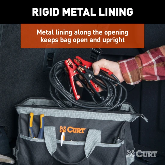 A CURT tool bag featuring multiple pockets for organized towing accessories storage, comfort-grip handles, and reinforced straps.