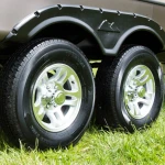 Lippert Idler Hub Assembly for 2,200 lb axles featuring a 5 on 4.5 inch bolt pattern, durable iron construction