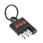 REESE Towpower electrical circuit tester connected to a vehicle's 4-flat connector.